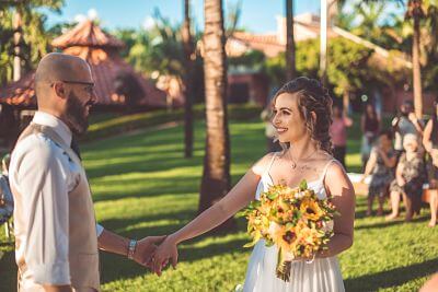image of Couple with flower bouquet in their hands